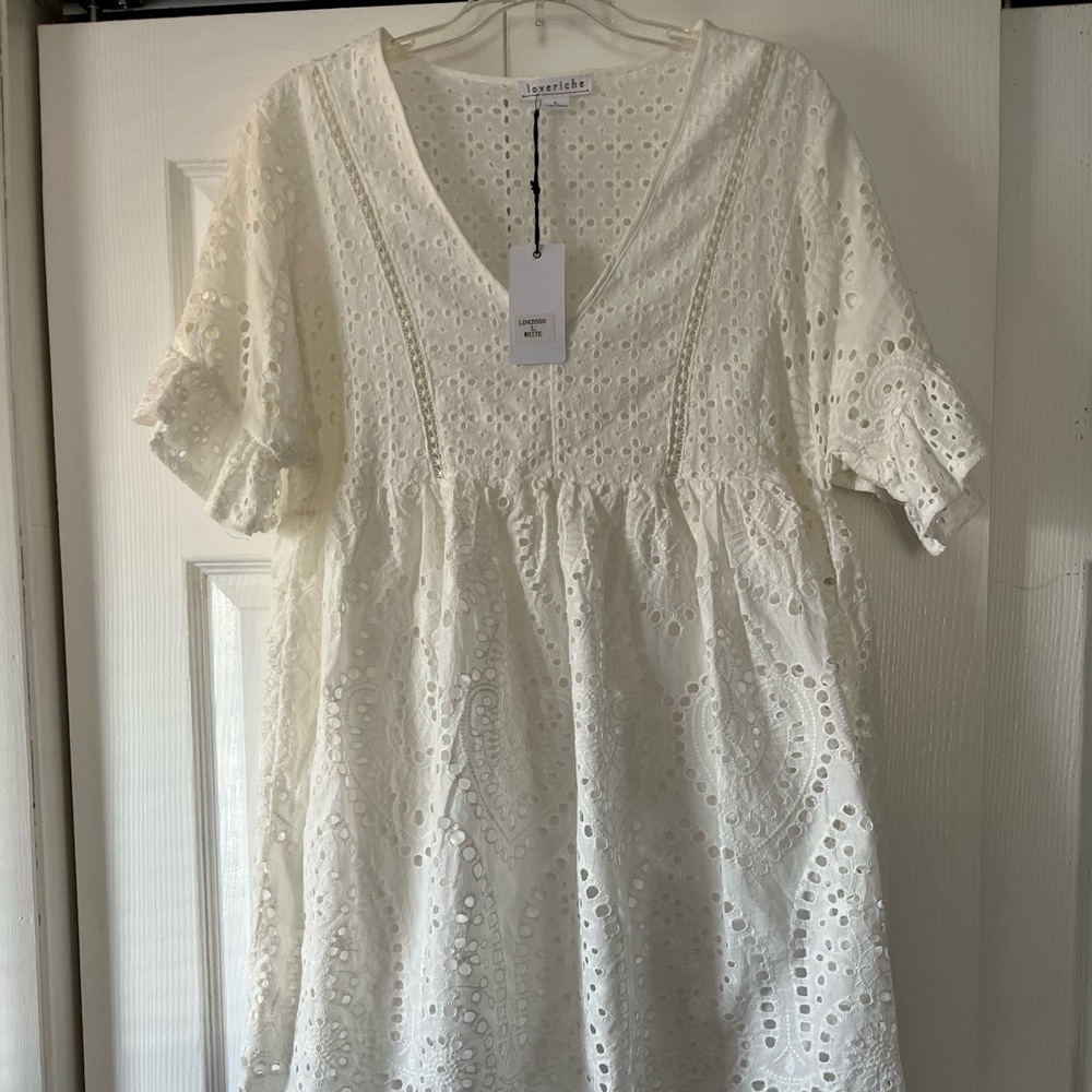 Boutique purchased white eyelet midi dress with liner. Size L.